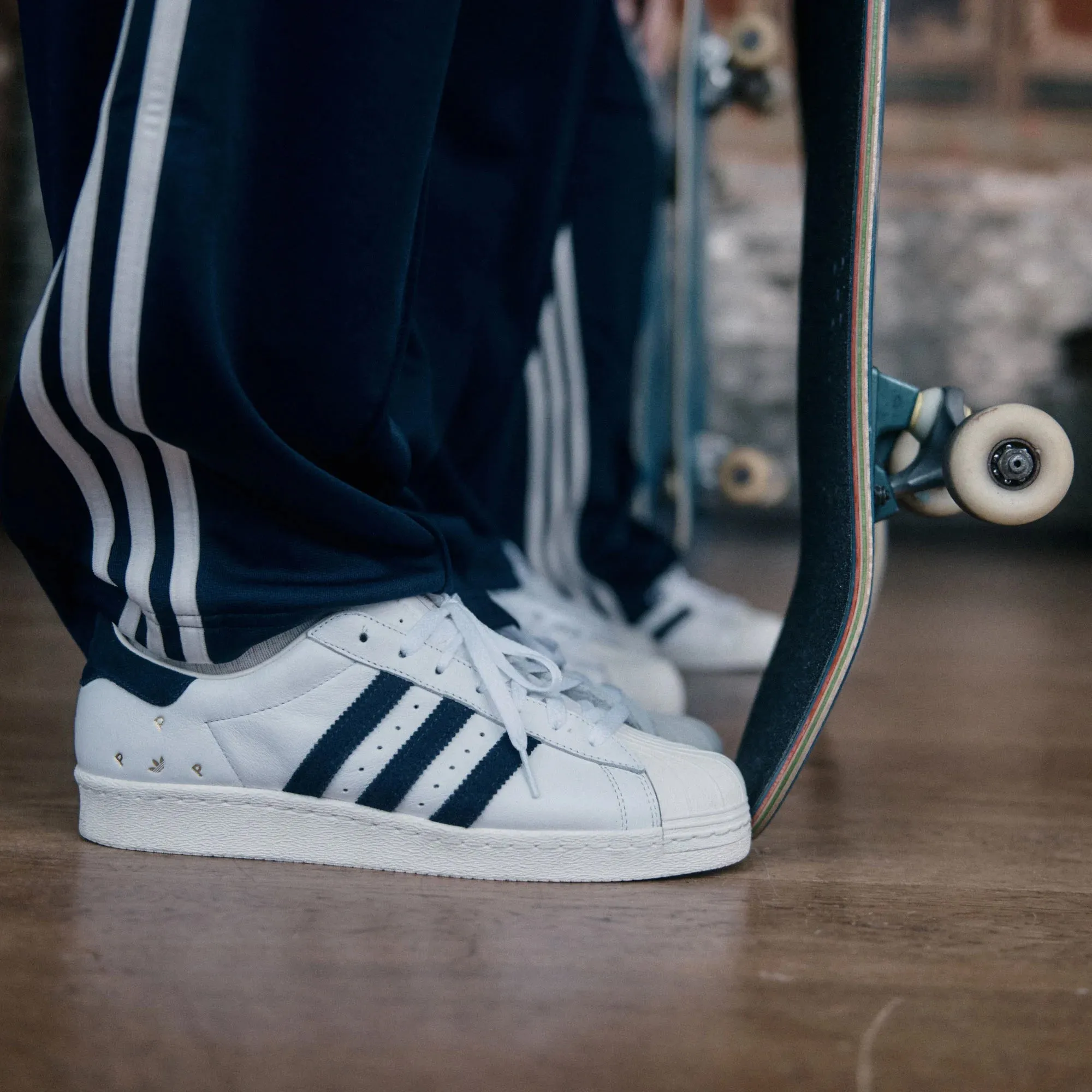 Adidas Originals | POP TRADING CO SUPERSTAR ADV TRAINERS  { CLOUD WHITE/NAVY/CHALK WHITE